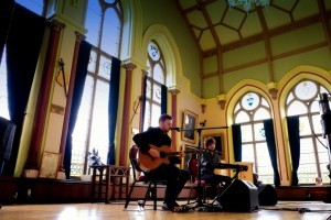 Lionel playing an acoustic set at a goNORTH event