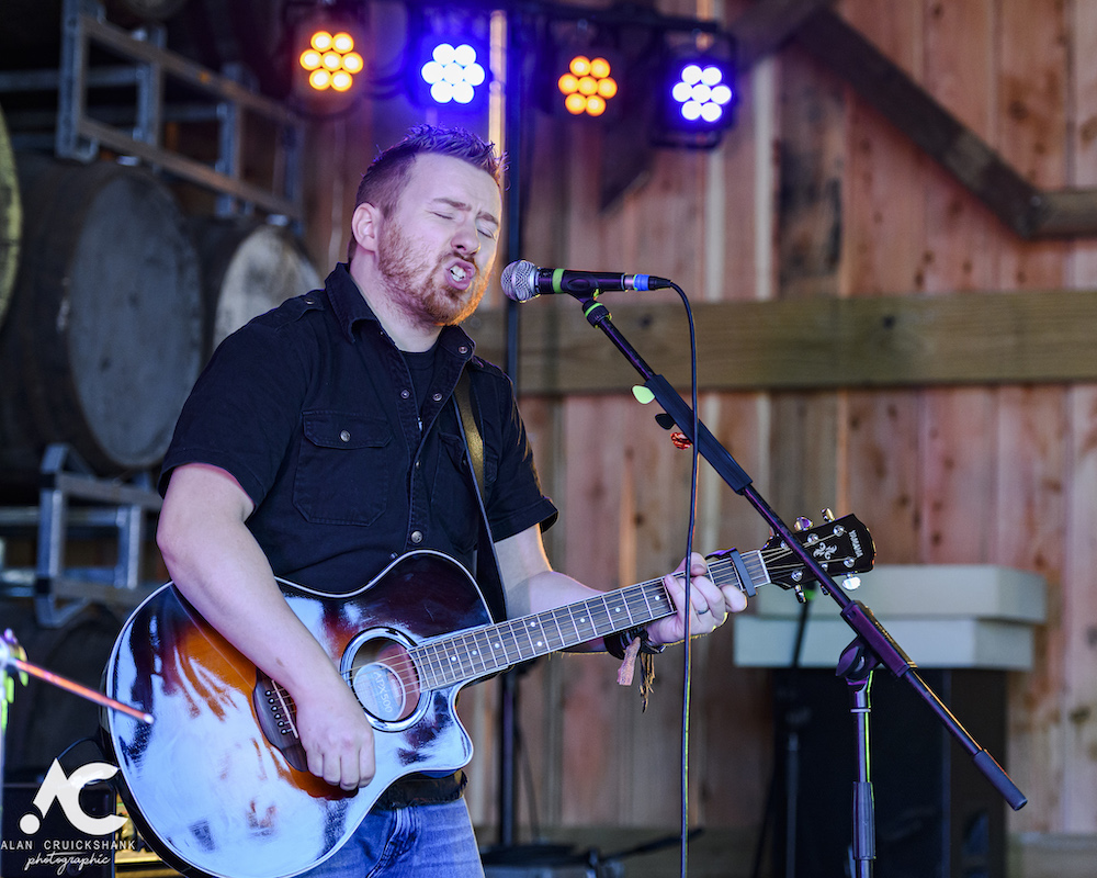 Photographs of Danny Mortimer on the Hayloft Stage 892019. 123 - Danny Mortimer - Interview